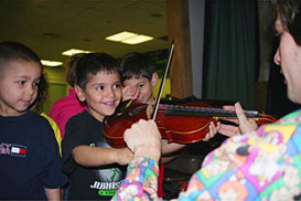 violinist houston tx works with child